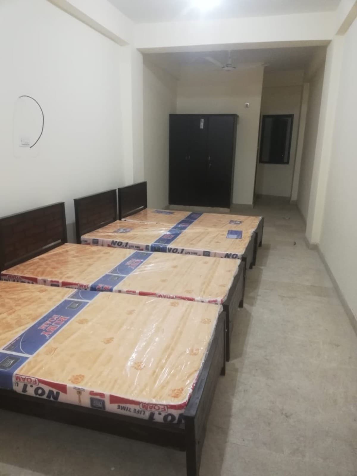 AlKhair Boys Hostel IJP Road Rawalpindi – bedroom cupboard fan